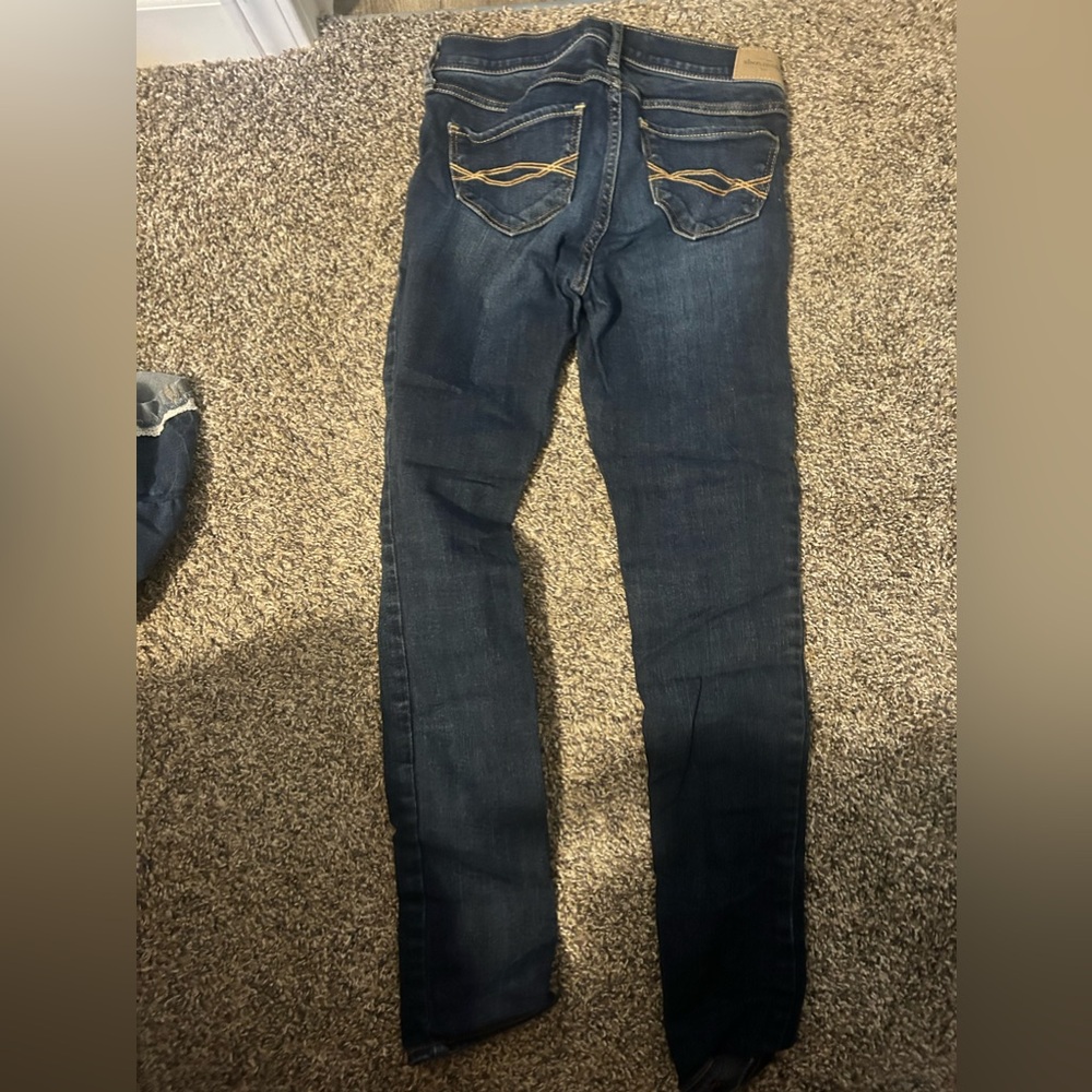 Abercrombie kids 14 skinny jeans fits like a 10 because tight